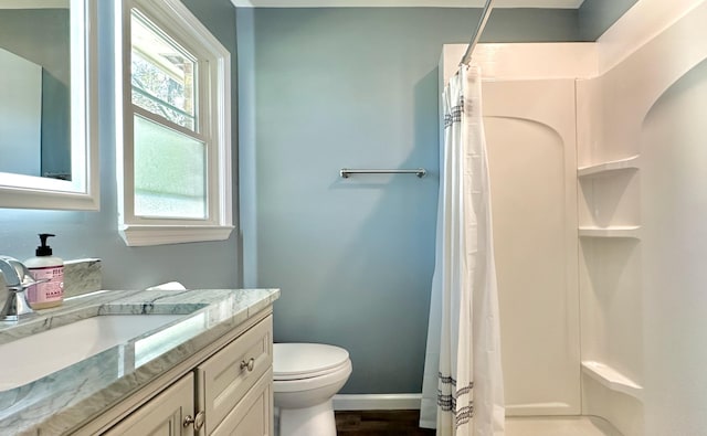 2636 Elissa Dr, Charleston, SC 29414 - bathroom featuring plenty of natural light, a shower with shower curtain, toilet, and baseboards