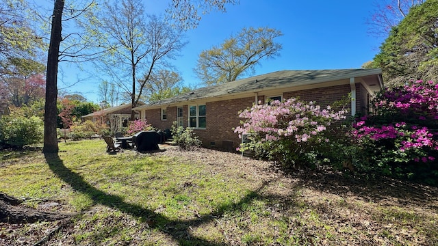 2636 Elissa Dr, Charleston, SC 29414 - back of property with crawl space, brick siding, and a lawn