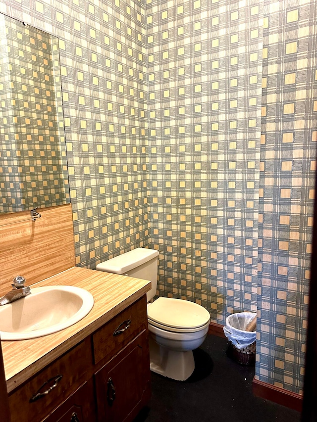 bathroom with vanity and toilet