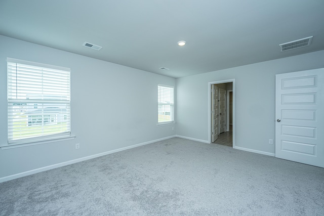 unfurnished bedroom featuring carpet