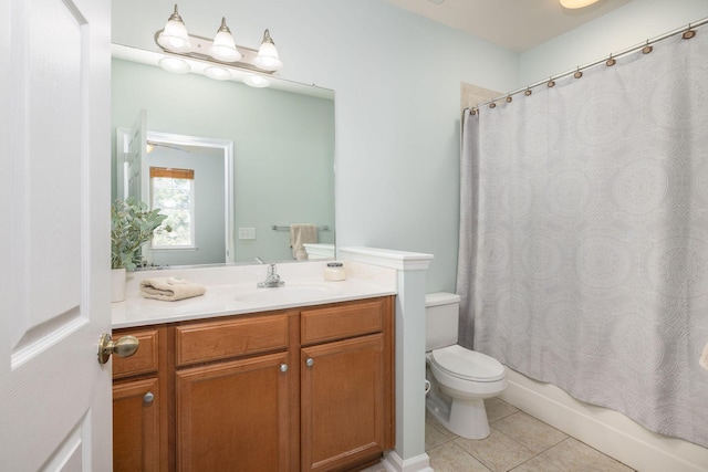 full bath with toilet, shower / tub combo, tile patterned flooring, and vanity