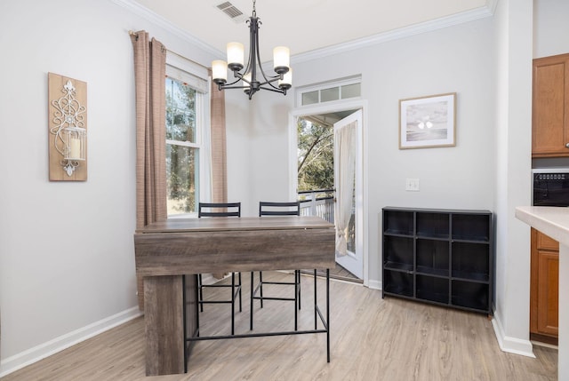 dining space with crown molding, light wood finished floors, visible vents, an inviting chandelier, and baseboards