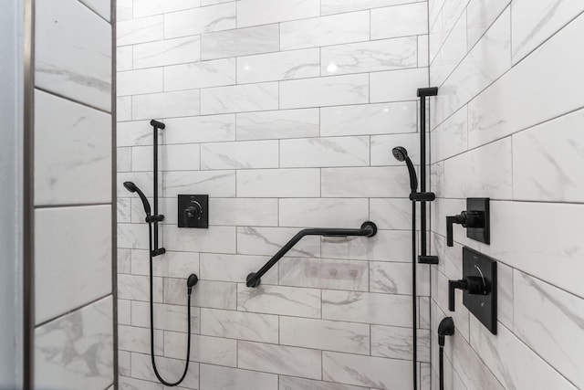 full bathroom with a tile shower