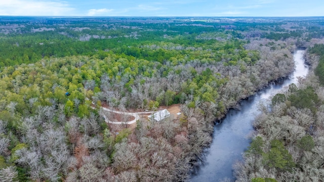 aerial view with a wooded view