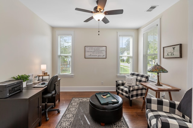 office space with ceiling fan and dark hardwood / wood-style flooring