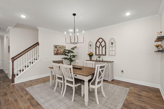 dining space with stairway, baseboards, ornamental molding, and wood finished floors