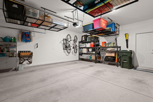 garage featuring baseboards