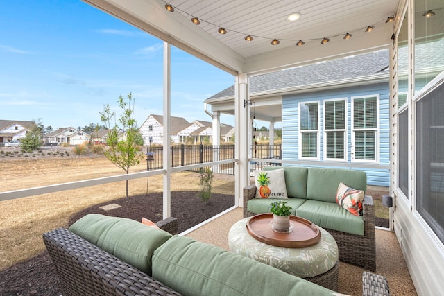 sunroom with a residential view