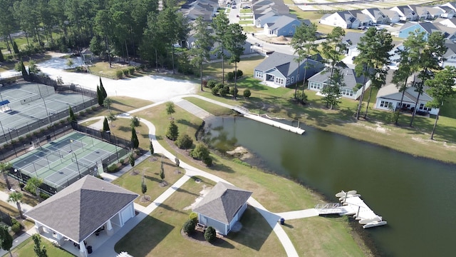 bird's eye view featuring a water view and a residential view