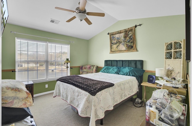 bedroom with visible vents, a ceiling fan, carpet, baseboards, and vaulted ceiling