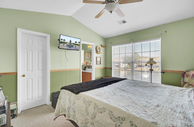 bedroom featuring visible vents, ceiling fan, vaulted ceiling, a closet, and light carpet