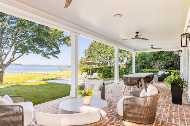 202 Bank St, Mount Pleasant, SC 29464 - view of patio / terrace with ceiling fan, a water view, outdoor dining area, and an outdoor living space