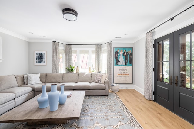 202 Bank St, Mount Pleasant, SC 29464 - living area featuring french doors, ornamental molding, baseboards, and wood finished floors