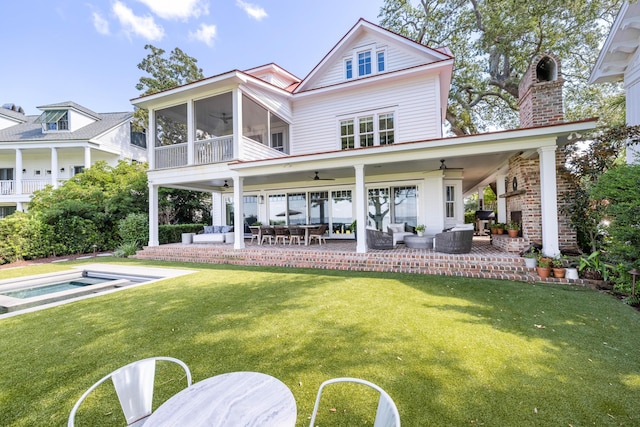 202 Bank St, Mount Pleasant, SC 29464 - back of property featuring ceiling fan, outdoor lounge area, and a yard