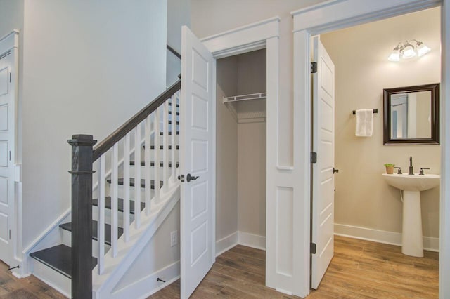 stairway with wood-type flooring