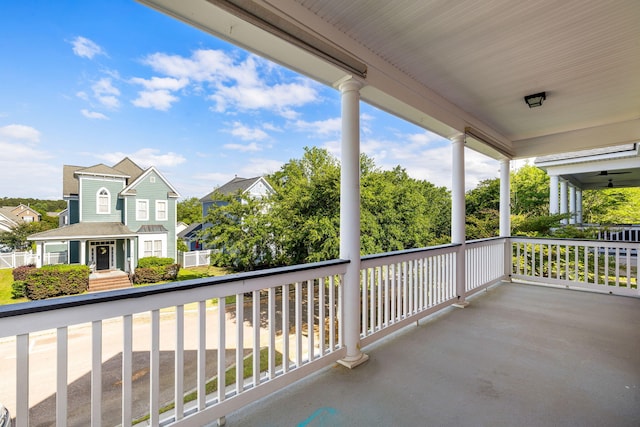 balcony featuring a porch and a residential view