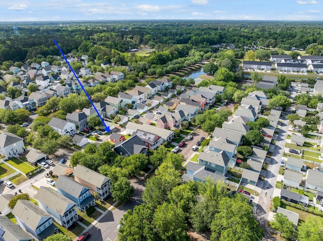 aerial view with a view of trees and a residential view