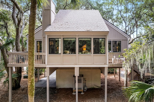 rear view of property with a deck