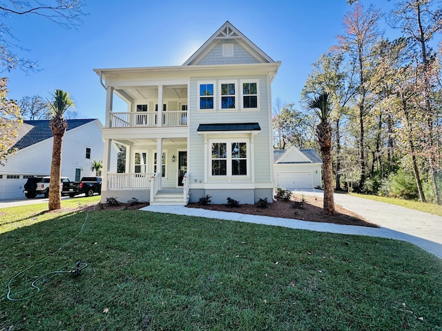 view of front facade with a garage, a balcony, a porch, and a front lawn