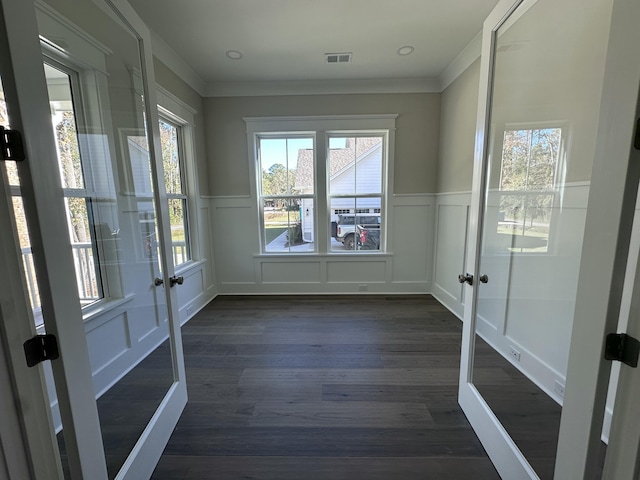 interior space featuring french doors and a healthy amount of sunlight