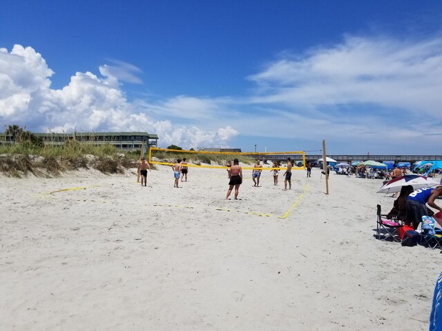 surrounding community featuring volleyball court