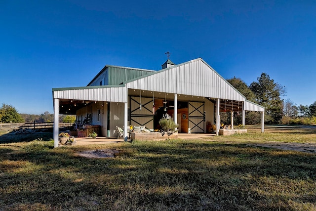 view of shed / structure with a lawn