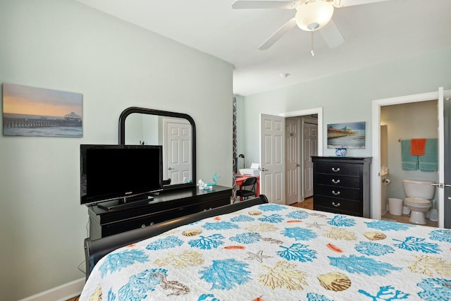 bedroom featuring hardwood / wood-style floors, ceiling fan, and ensuite bathroom