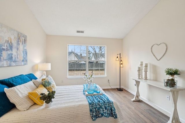 bedroom featuring hardwood / wood-style floors