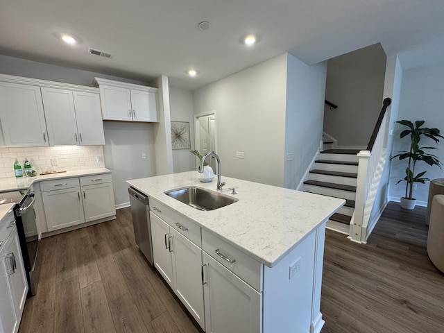 131 Brown Swiss Cir, Summerville, SC 29483 - kitchen featuring white cabinets, dark wood-type flooring, a sink, and appliances with stainless steel finishes