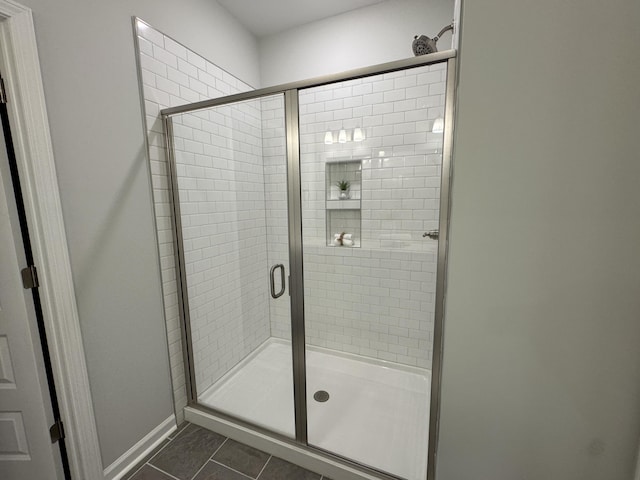 131 Brown Swiss Cir, Summerville, SC 29483 - bathroom with tile patterned floors, baseboards, and a stall shower