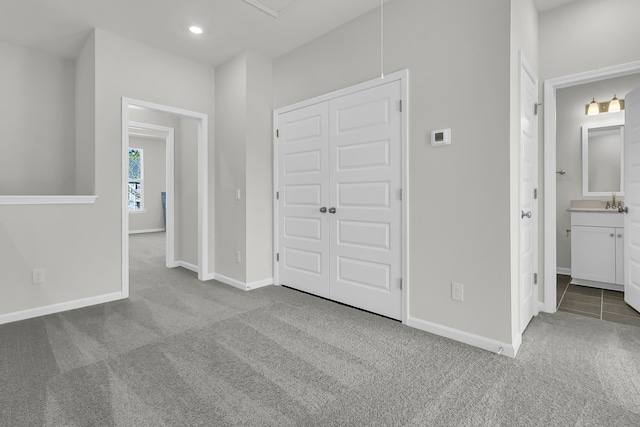131 Brown Swiss Cir, Summerville, SC 29483 - unfurnished bedroom featuring carpet flooring, a closet, baseboards, and connected bathroom