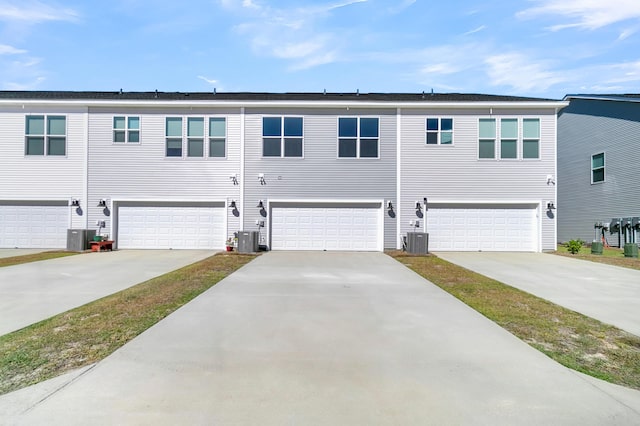 131 Brown Swiss Cir, Summerville, SC 29483 - view of front facade featuring an attached garage, driveway, and central AC unit
