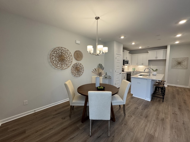 131 Brown Swiss Cir, Summerville, SC 29483 - dining area with dark wood-type flooring, an inviting chandelier, baseboards, and recessed lighting