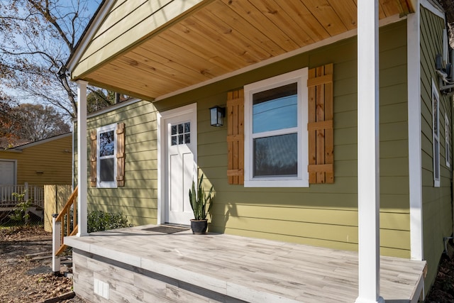 doorway to property with a wooden deck