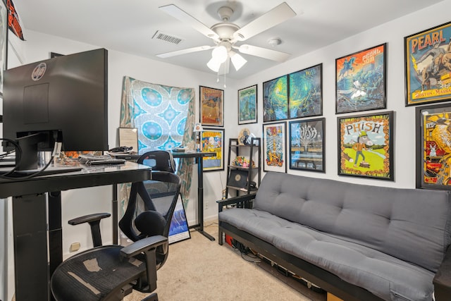 home office featuring baseboards, visible vents, ceiling fan, and carpet flooring