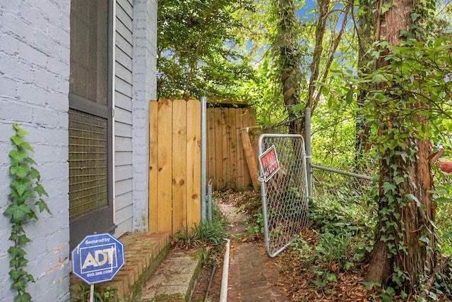 view of yard featuring a gate and fence