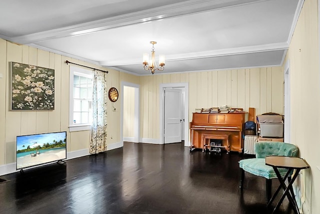 interior space featuring beamed ceiling, ornamental molding, a chandelier, and wood finished floors