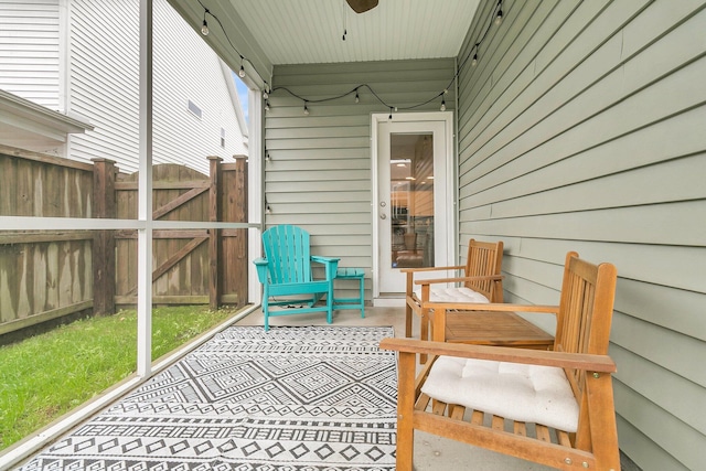 exterior space featuring ceiling fan