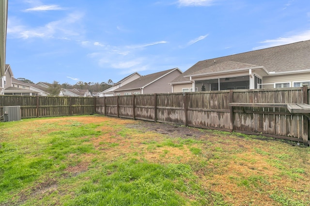 view of yard featuring central AC