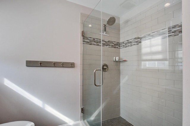 bathroom featuring a stall shower