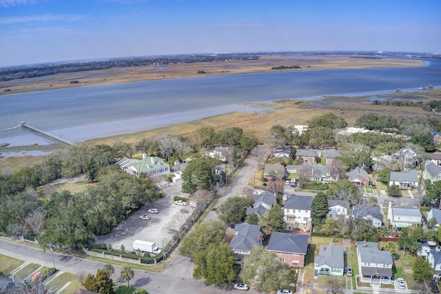 bird's eye view with a residential view and a water view