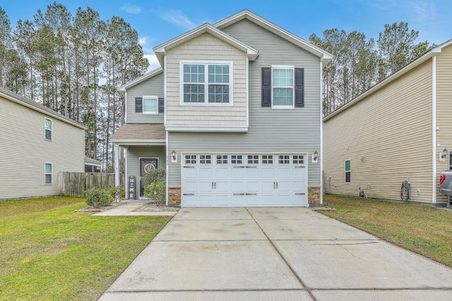 343 Iveson Rd, Summerville, SC 29486 - view of front of home with stone siding, concrete driveway, fence, a front lawn, and a garage