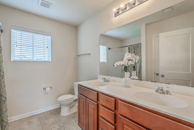 343 Iveson Rd, Summerville, SC 29486 - bathroom featuring toilet, a sink, curtained shower, and visible vents