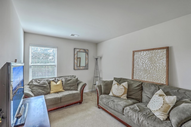 343 Iveson Rd, Summerville, SC 29486 - living room featuring carpet, baseboards, and visible vents