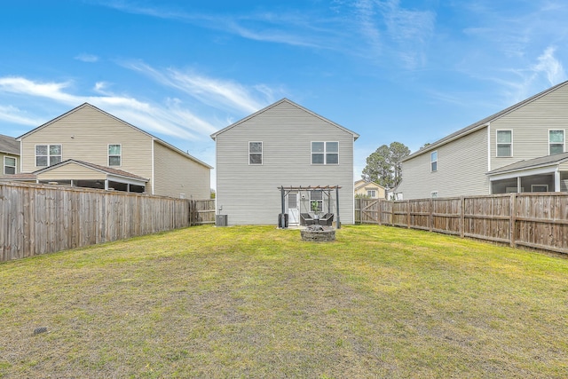 343 Iveson Rd, Summerville, SC 29486 - rear view of house with a fenced backyard, a lawn, and a pergola