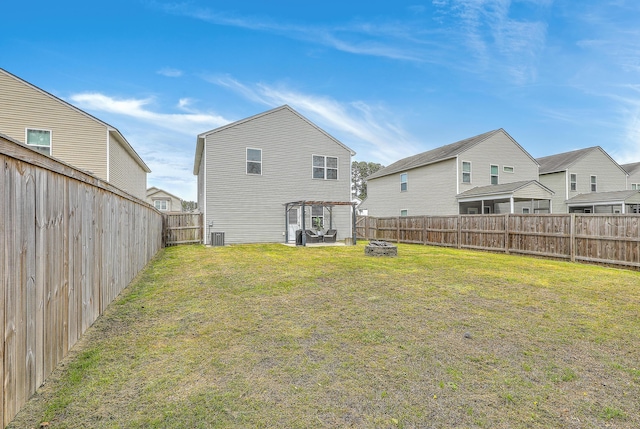 343 Iveson Rd, Summerville, SC 29486 - back of house with a lawn, an outdoor fire pit, and a fenced backyard