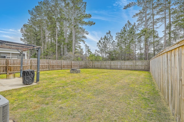 343 Iveson Rd, Summerville, SC 29486 - view of yard with a fenced backyard and a fire pit