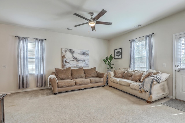 343 Iveson Rd, Summerville, SC 29486 - carpeted living room featuring plenty of natural light, visible vents, and ceiling fan