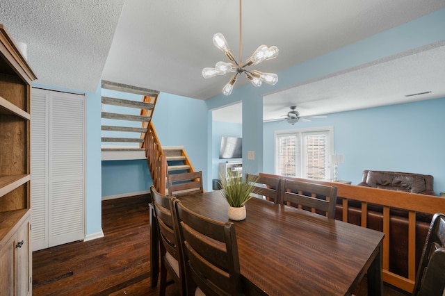 1101 Reserve Way, Summerville, SC 29485 - dining space featuring a textured ceiling, ceiling fan with notable chandelier, and dark hardwood / wood-style floors