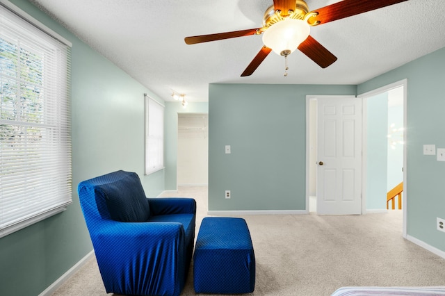 1101 Reserve Way, Summerville, SC 29485 - living area with ceiling fan, light colored carpet, and a textured ceiling